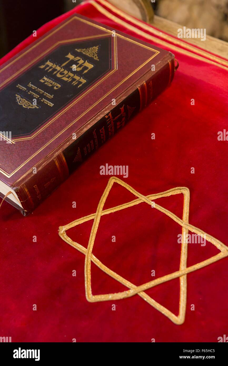Symbols of the Jewish religion: a bima cloth, Star of David and the Tora Stock Photo