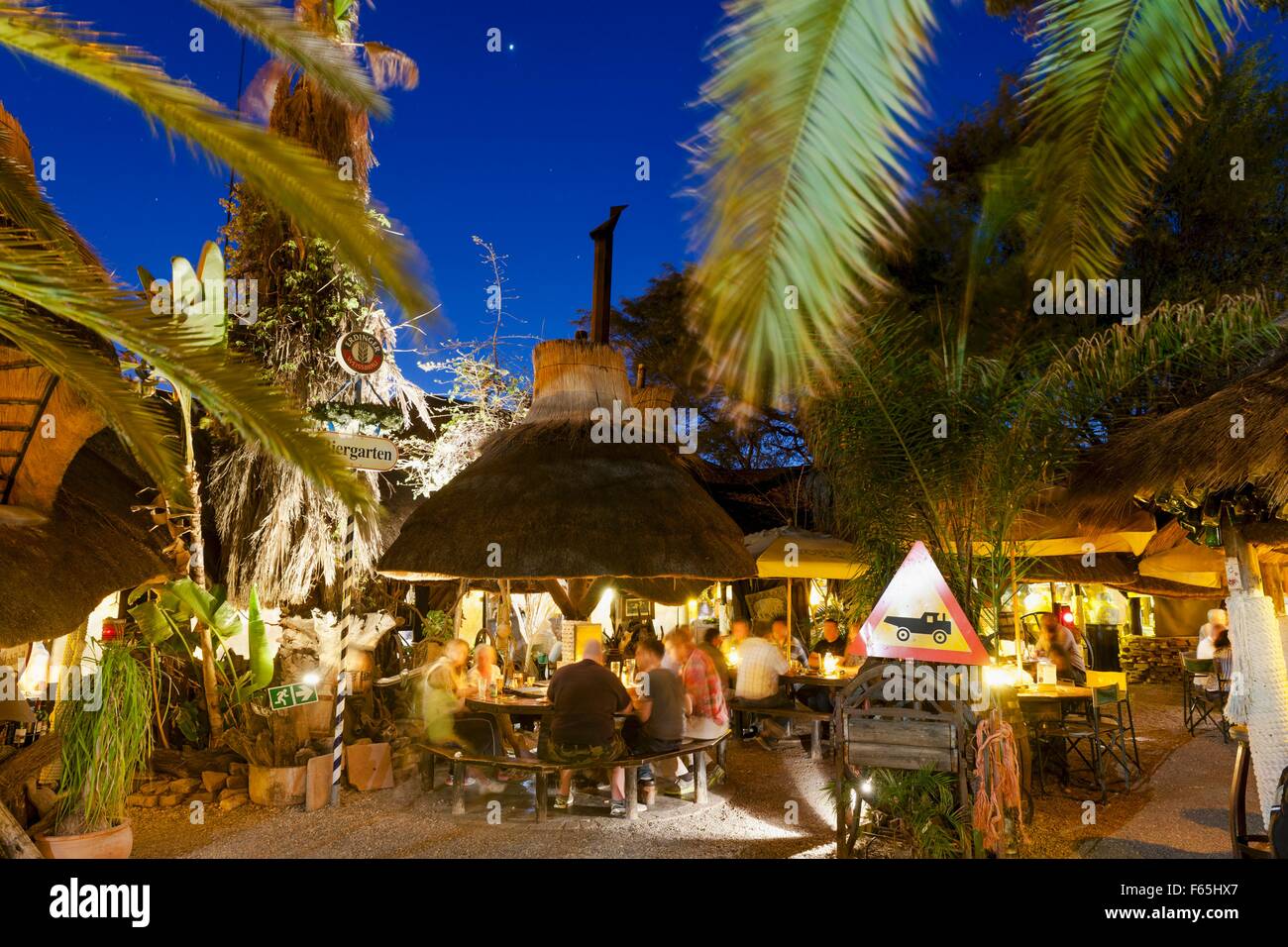 Drinks under palm trees at Joe's Beerhouse, Windhoek, Namibia, Africa