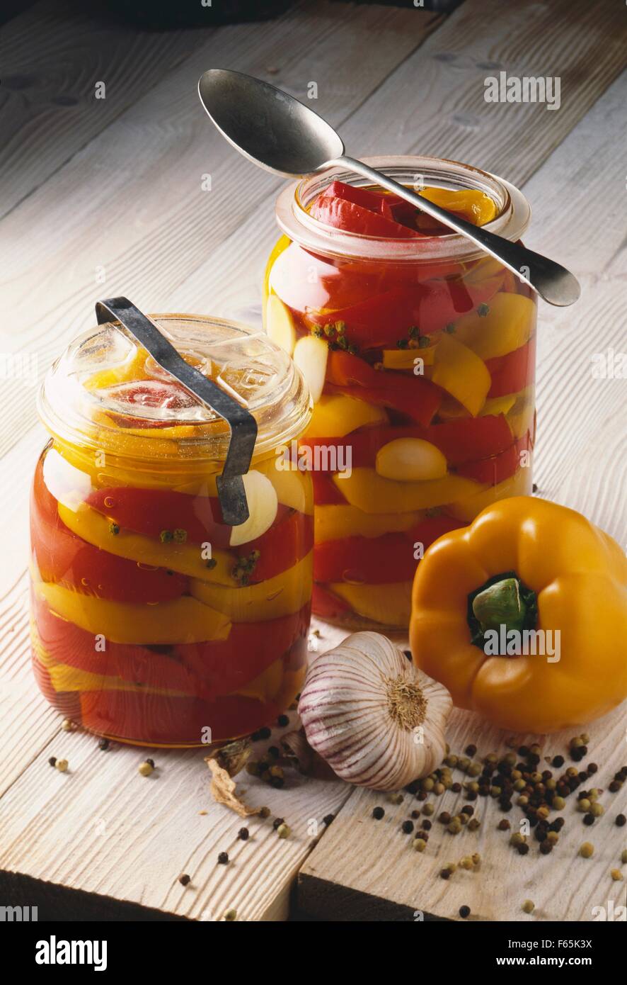 Jars of yellow and red peppers Stock Photo Alamy