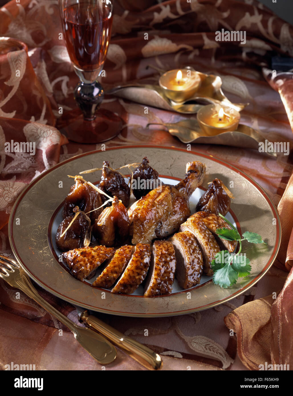 Peking duck with figs and autumn fruit honey Stock Photo