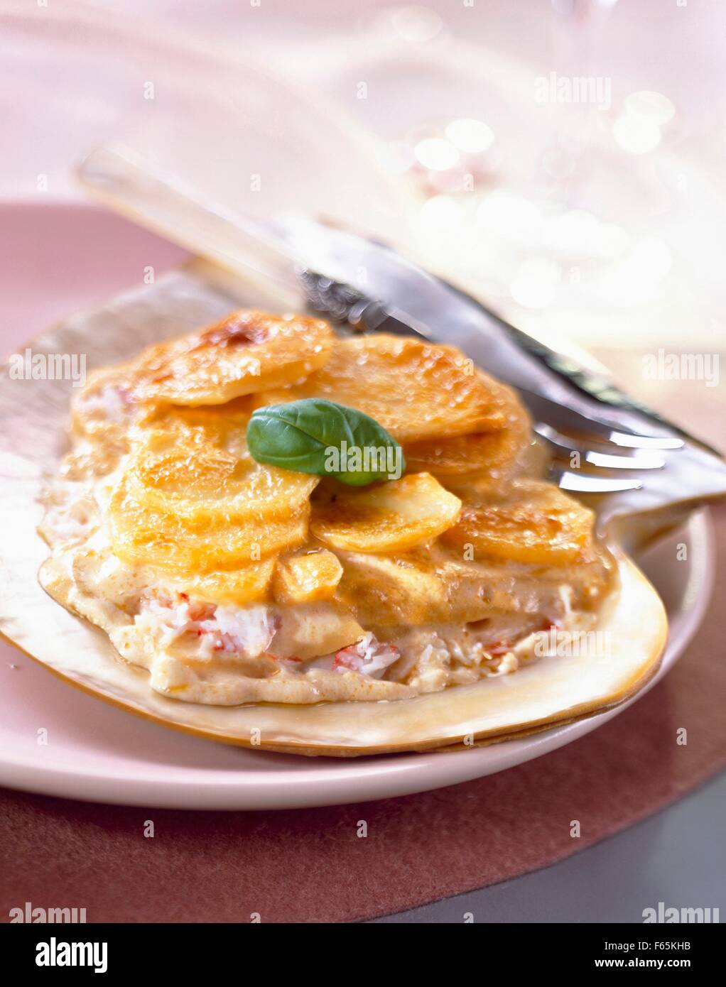 Crab Dauphinois with lobster bisque Stock Photo Alamy