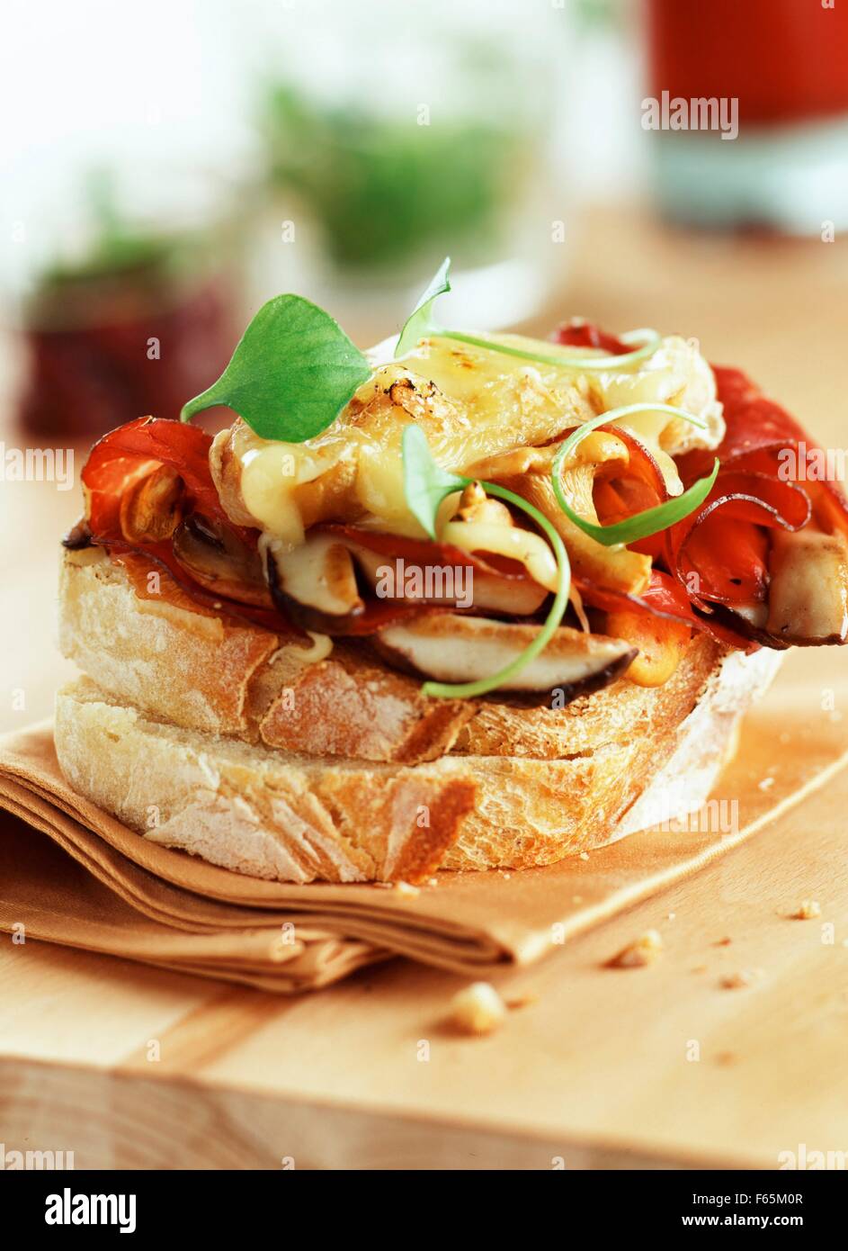 Rocamadour cheese and mushroom open sandwich Stock Photo