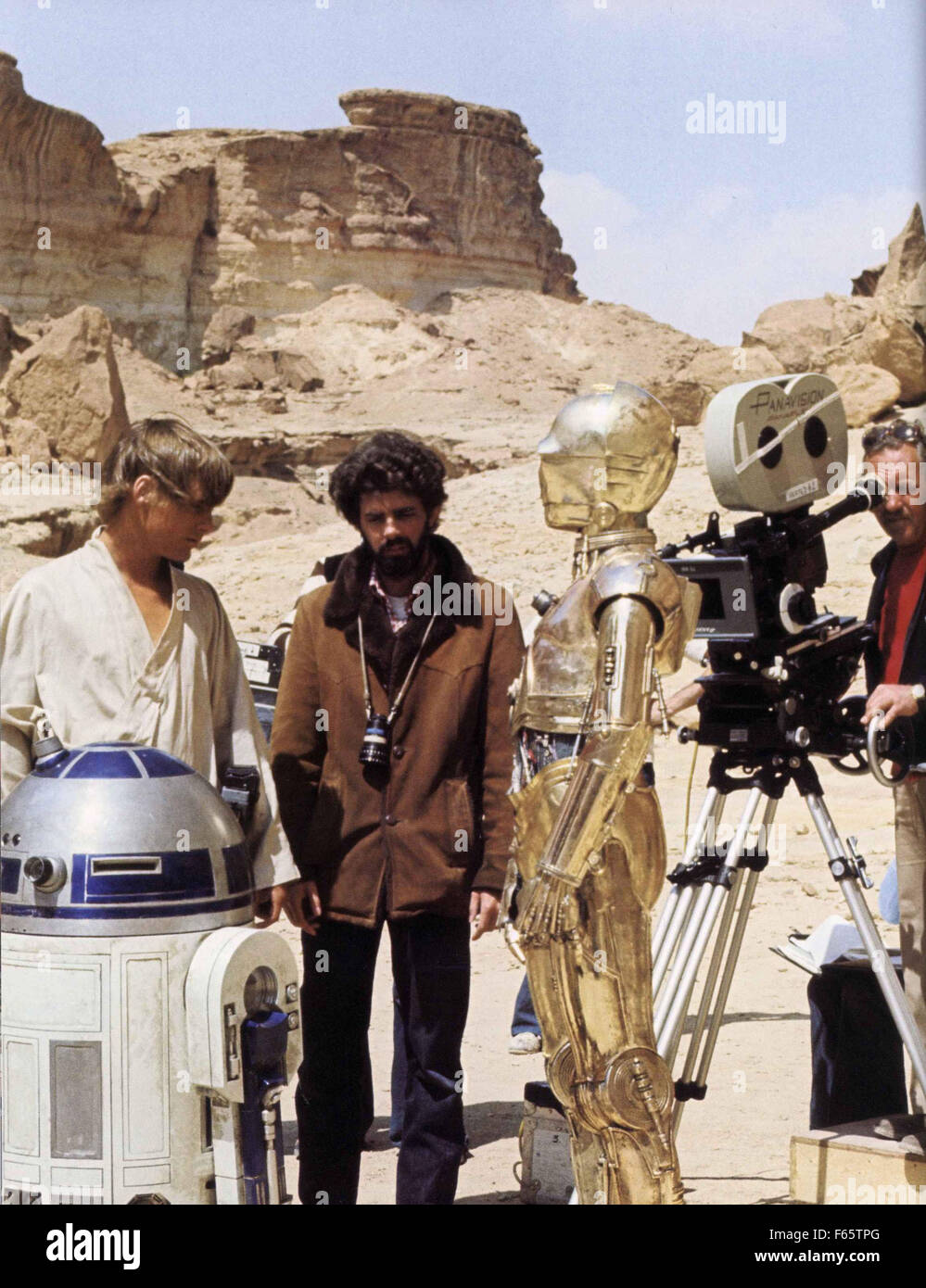 Star Wars: Episode IV - A New Hope Year : 1977 USA Director : George Lucas Mark Hamill, George Lucas, Anthony Daniels, Kenny Baker Shooting picture Stock Photo