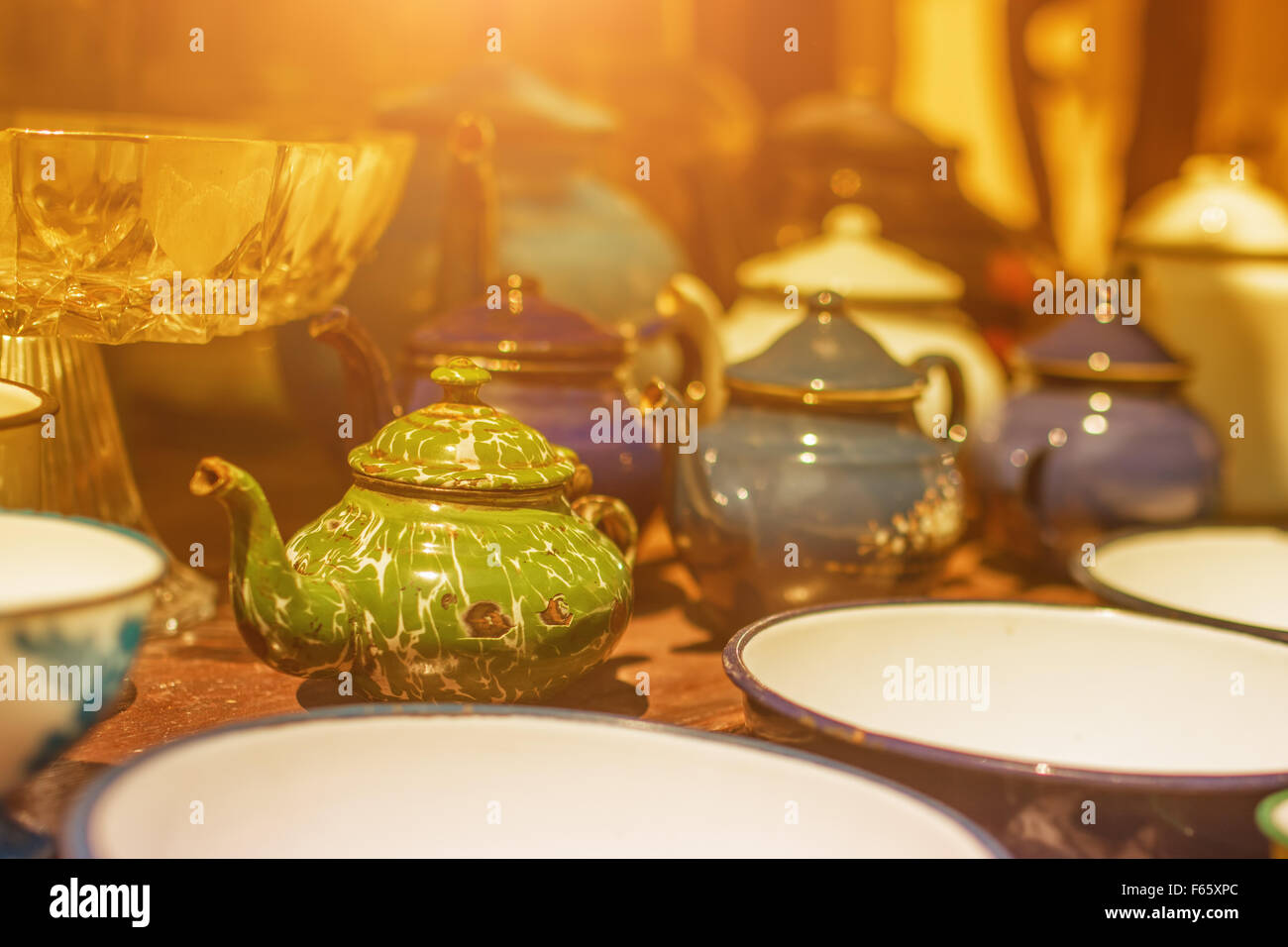 Image of traditional eastern teapot and teacups on wooden desk Stock Photo