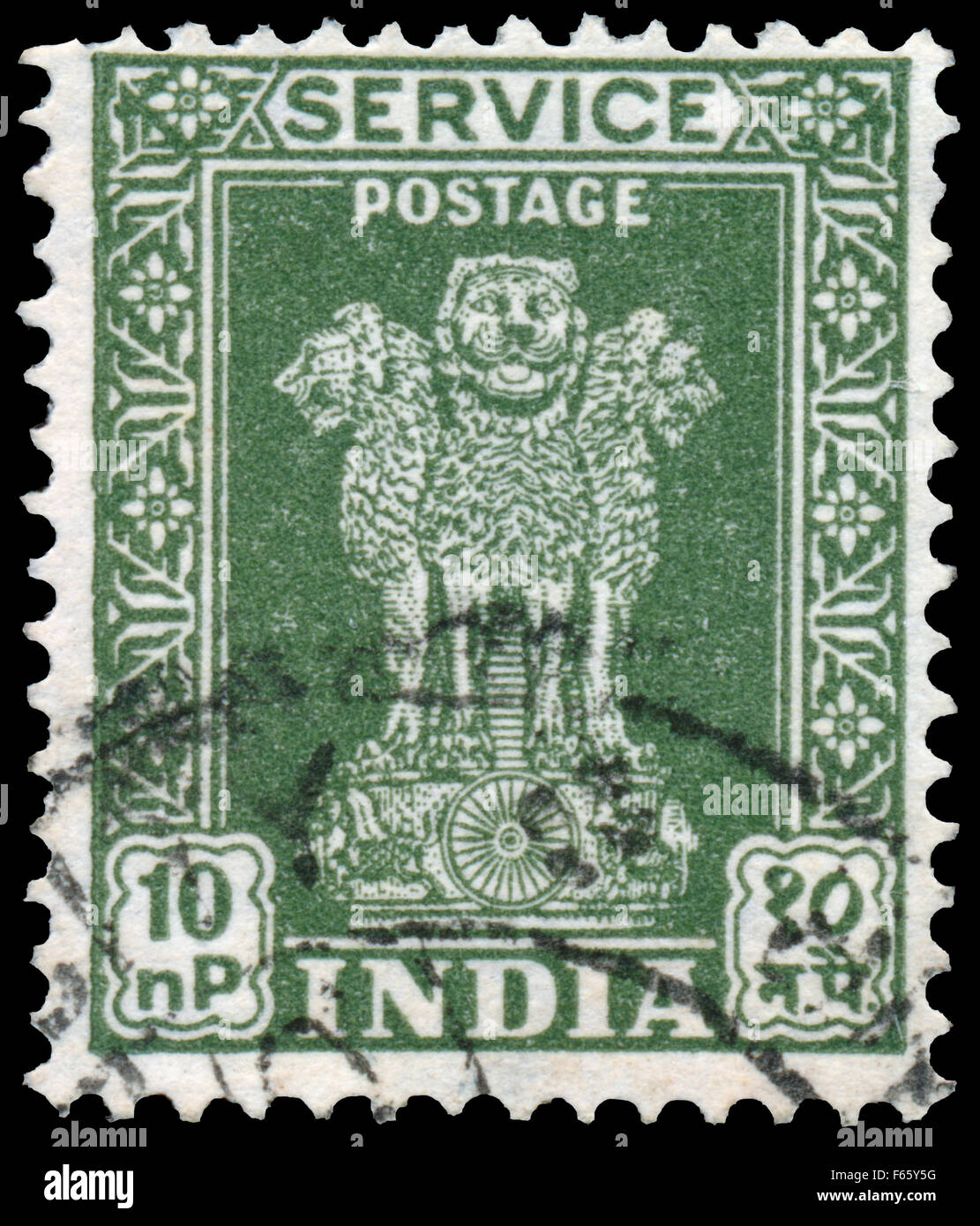 INDIA - CIRCA 1958: Stamp printed in India shows four Indian lions capital of Ashoka Pillar, circa 1958. Stock Photo