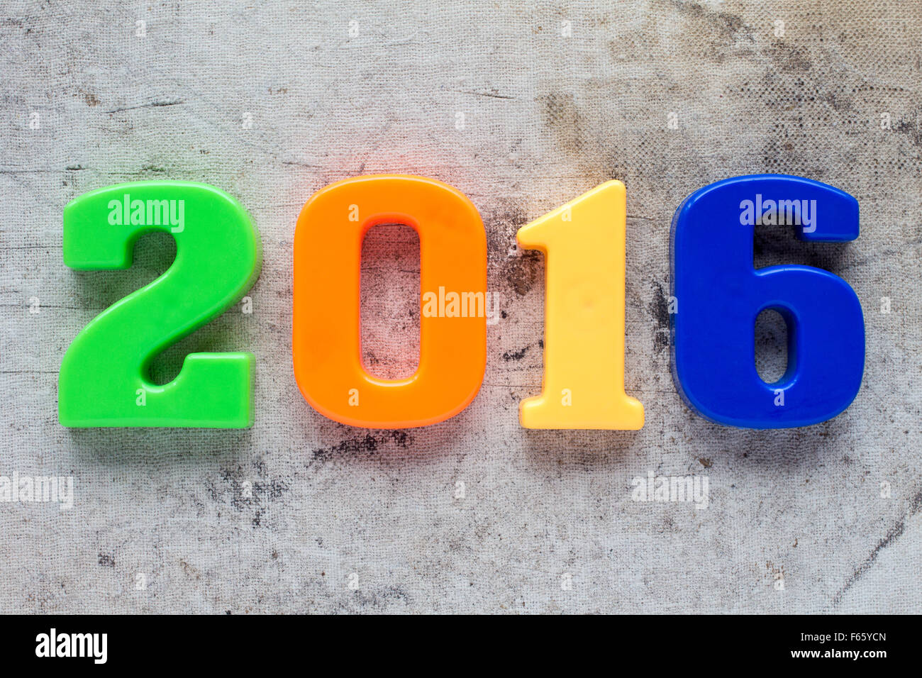 2016 colorful plastic number on the dirty background Stock Photo - Alamy