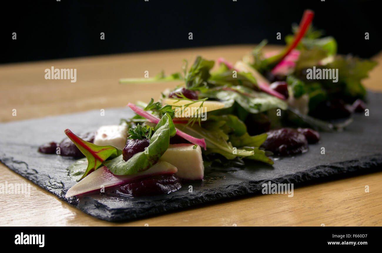 A starter of food on a slate plate Stock Photo