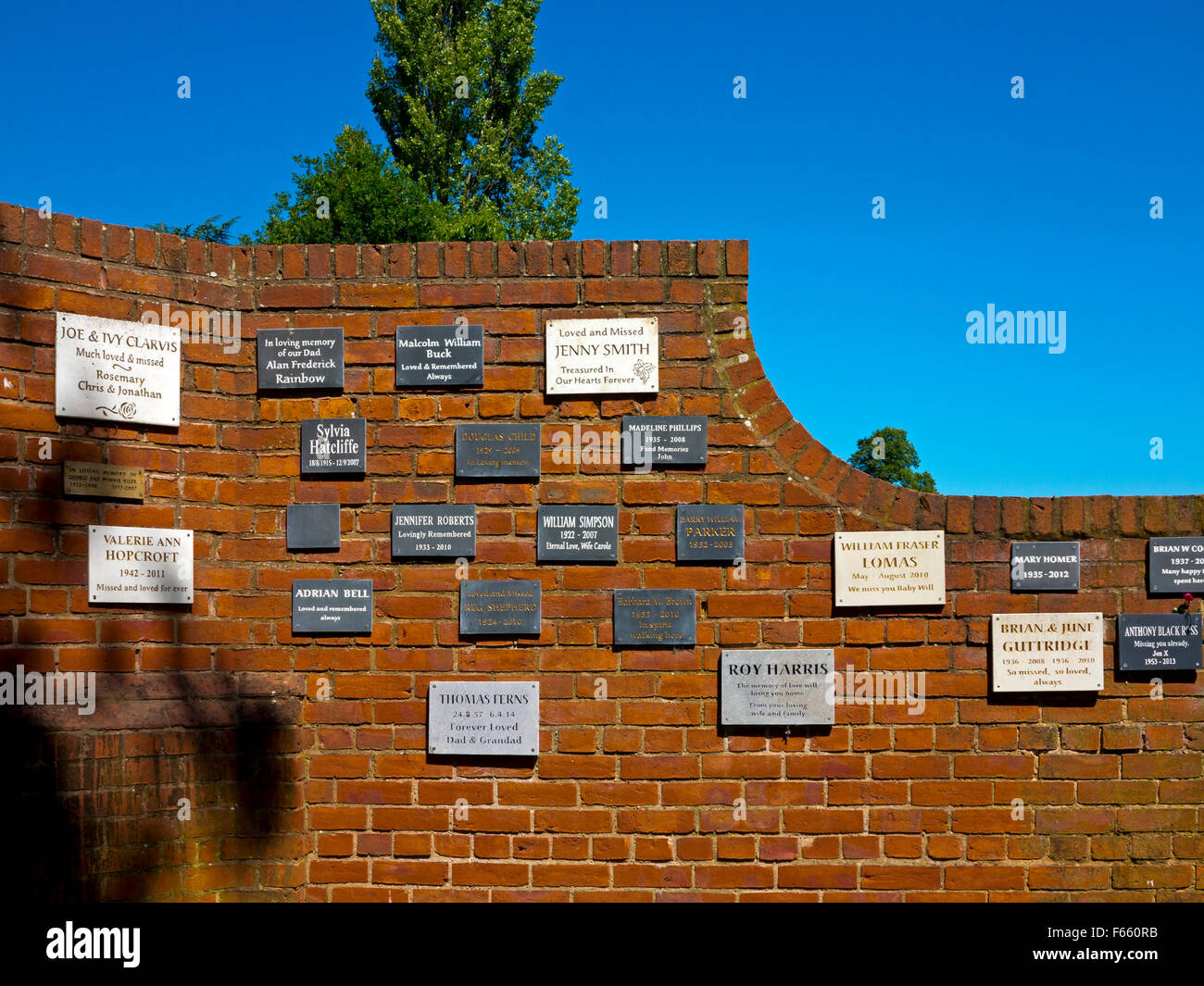 Memorial plaques on a brick wall at Rufford Abbey Ollerton in Nottinghamshire England UK in the grounds of Rufford Country Park Stock Photo