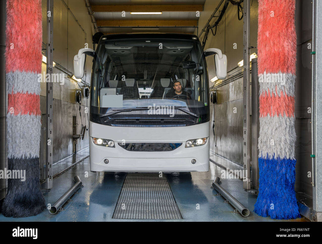 Tour bus in a large car wash. Stock Photo