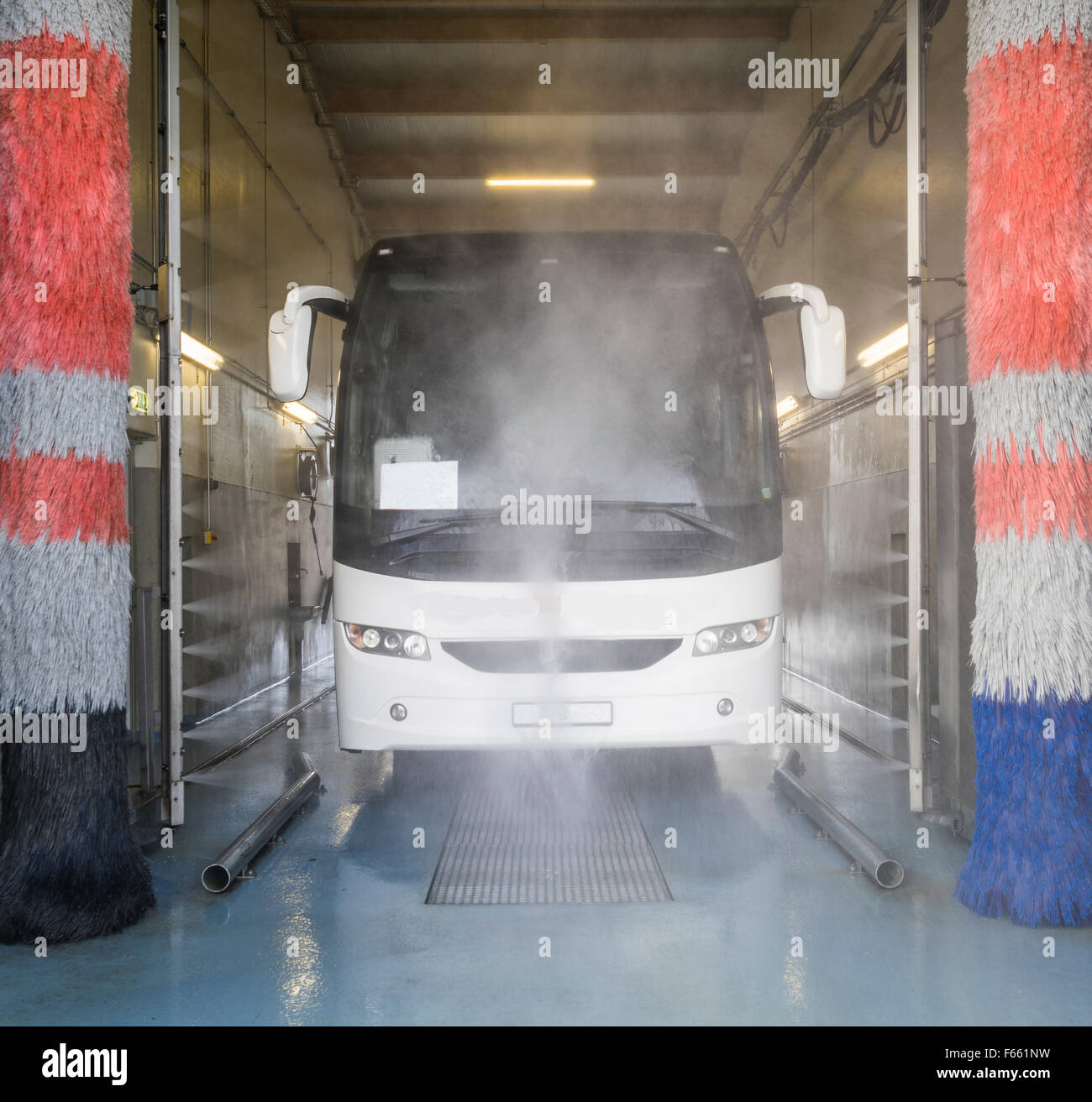 Tour bus in a large car wash. Stock Photo