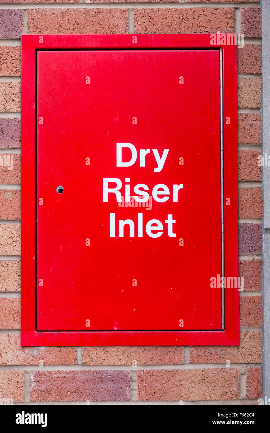 A Dry Riser Inlet sign on a door, UK Stock Photo