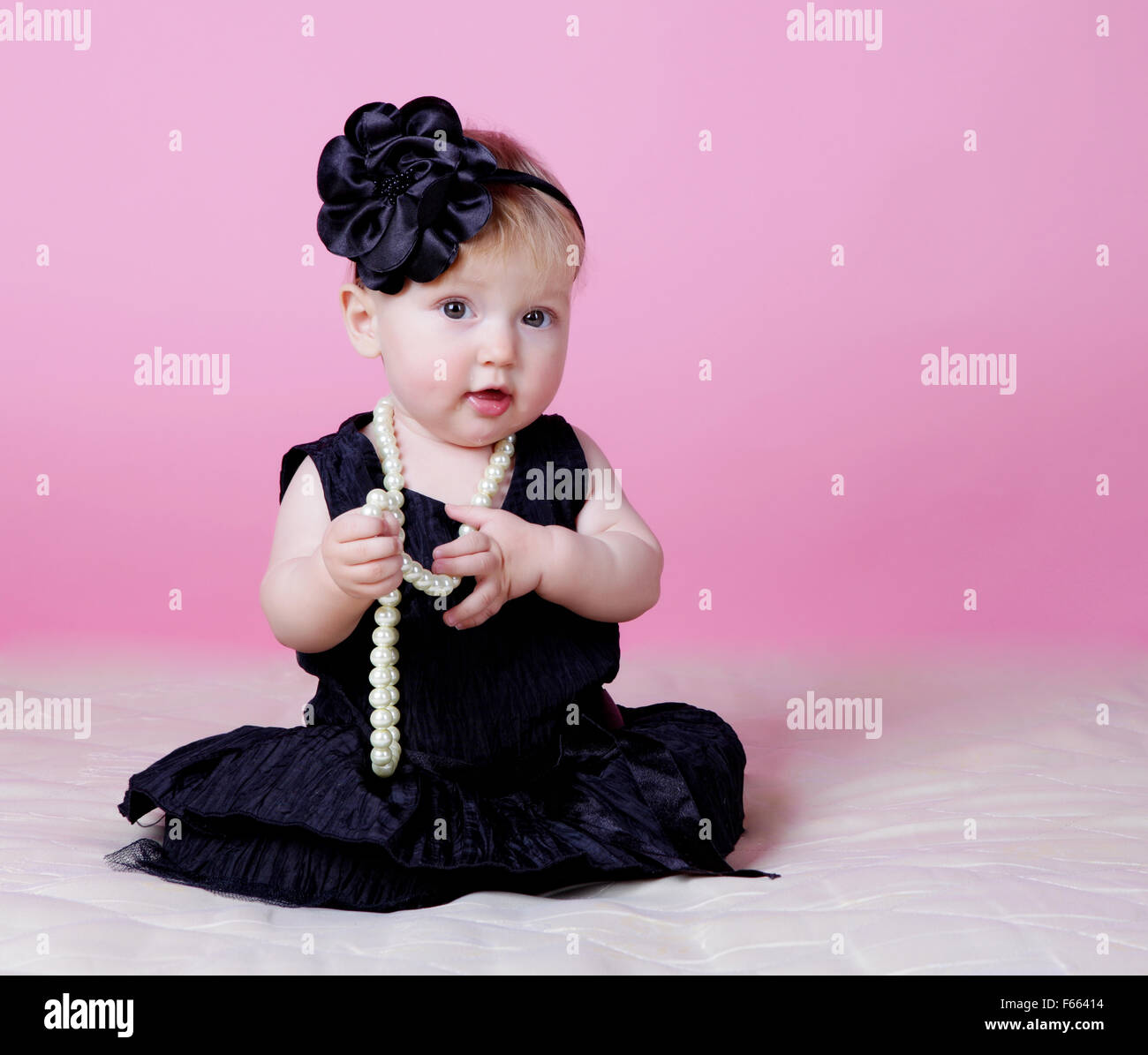 Little girl in black dress Stock Photo Alamy