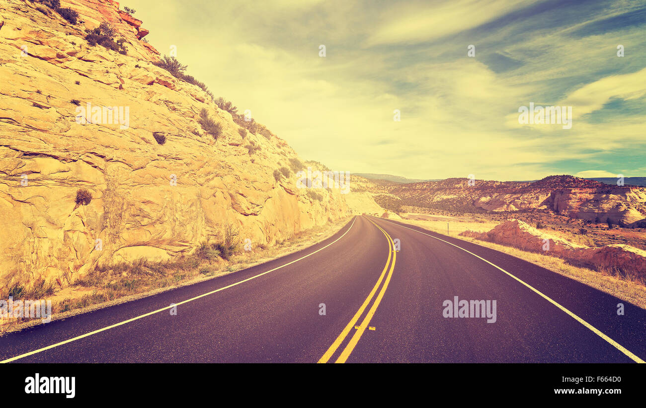 Vintage toned empty road, travel concept picture. Stock Photo