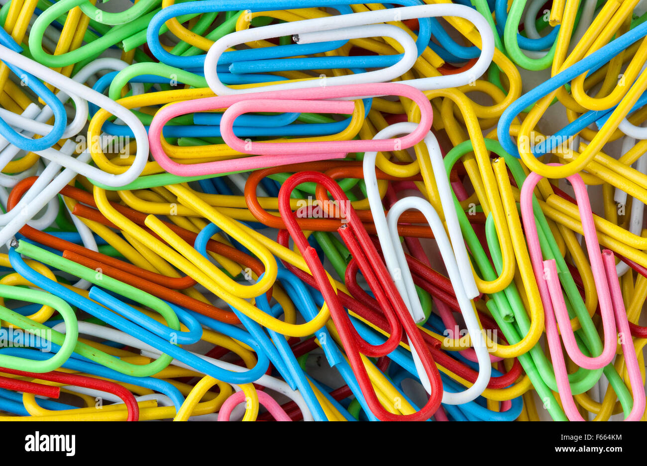Many colorful paper clips. Background or texture Stock Photo Alamy