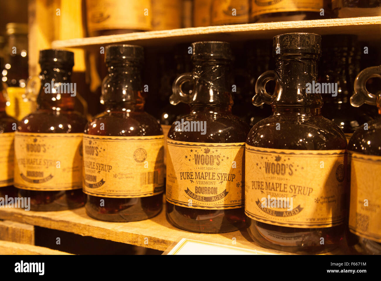 Bottles of Maple Syrup on the shelf in a store in Stowe, Vermont New England USA Stock Photo