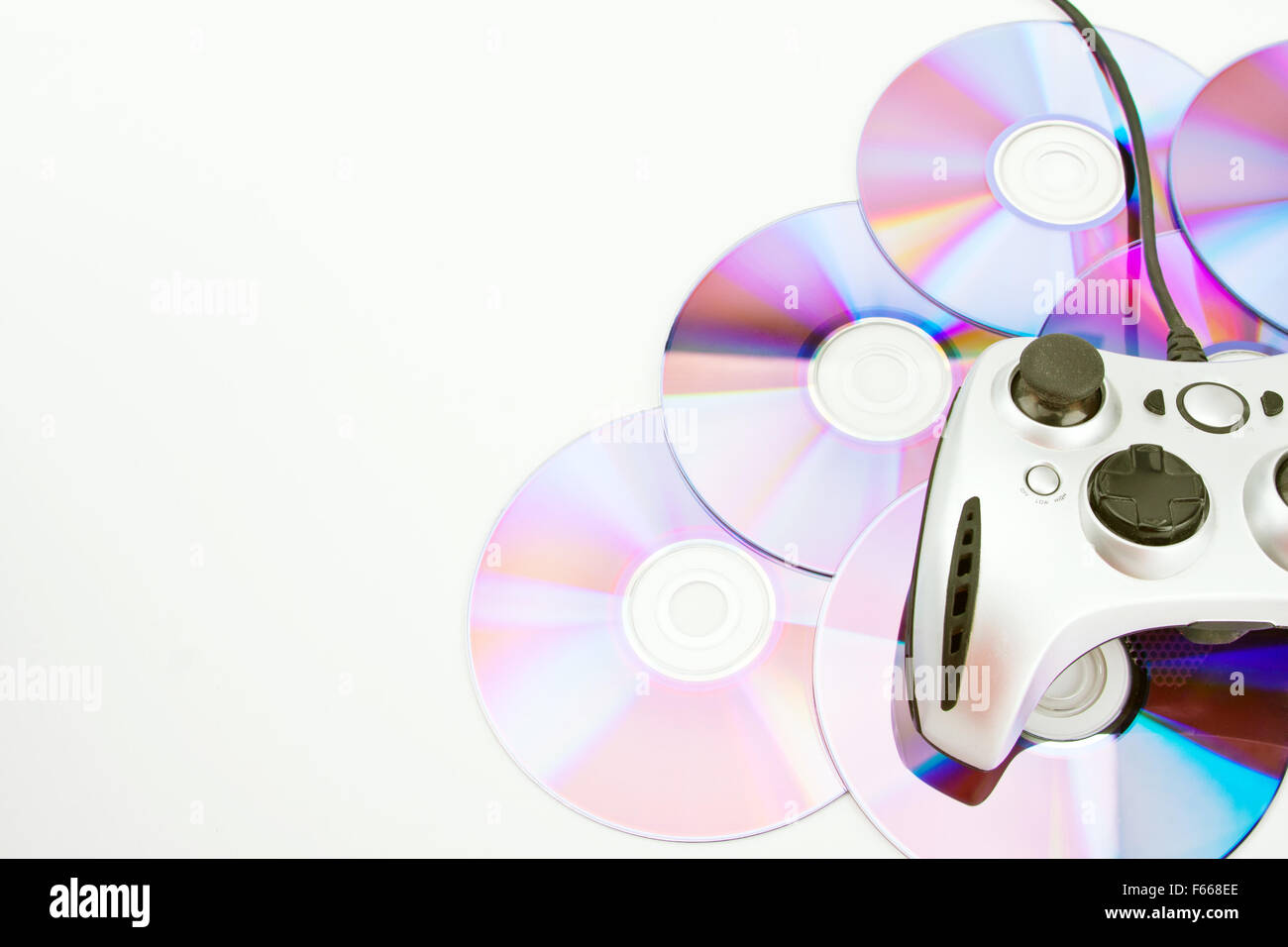 Gambling equipment: CD  and joystick. Time to play! Stock Photo