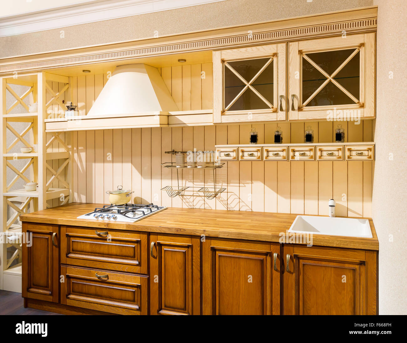 Modern spacious kitchen interior with wooden furniture Stock Photo - Alamy