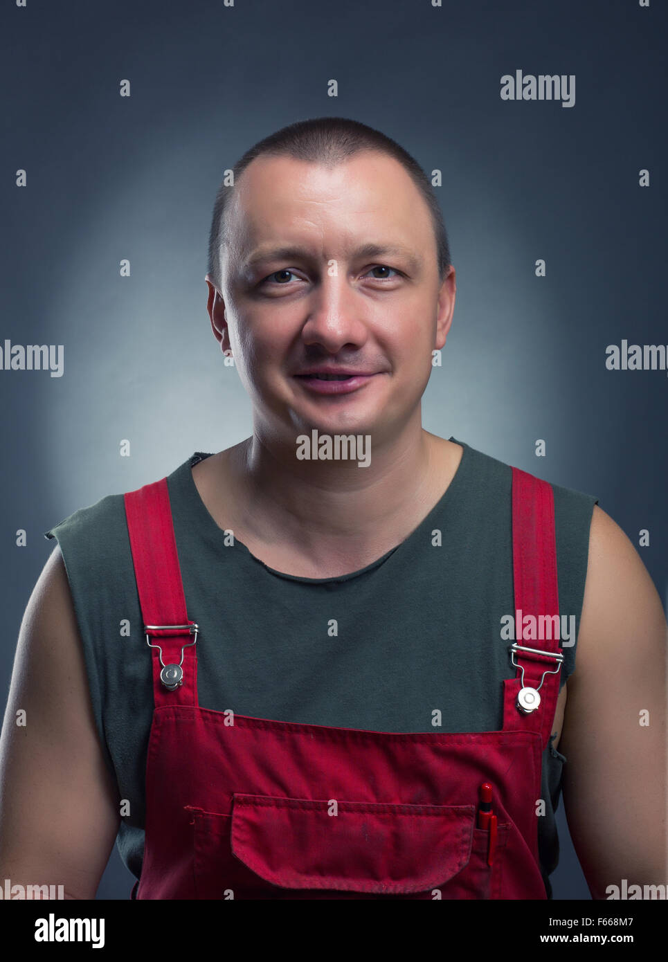 Portrait of smiling manual worker Stock Photo