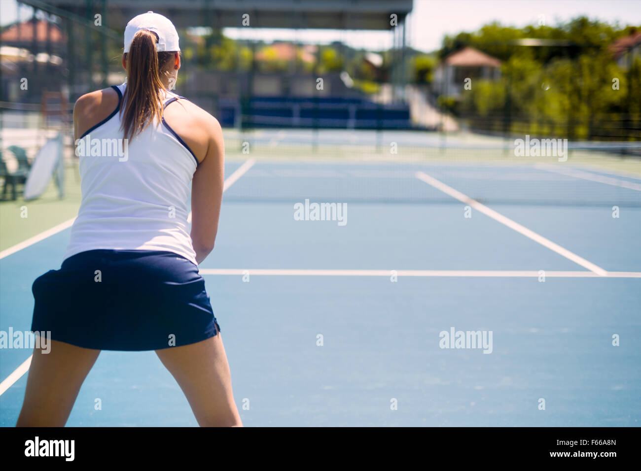 Female tennis player in a receiving service stance Stock Photo Alamy