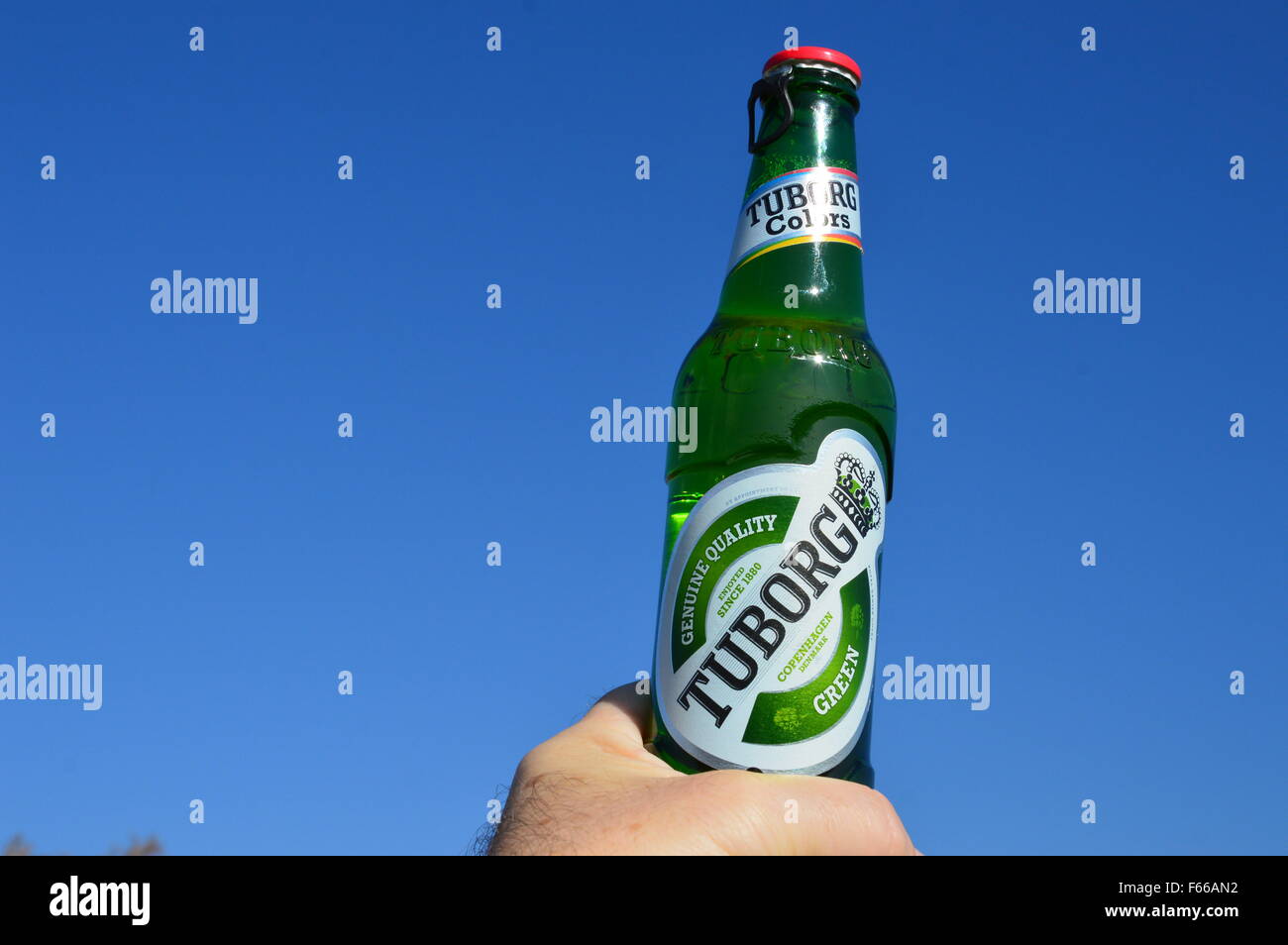 Illustrative bottle beer Tuborg on of backgrounds blue sky Stock Photo -  Alamy