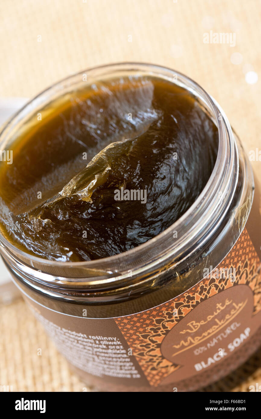 Savon Noir black soap open jar from Beaute Marrakech, natural cosmetic made of Olea europaea oil for skin, body hygiene cosmetic Stock Photo