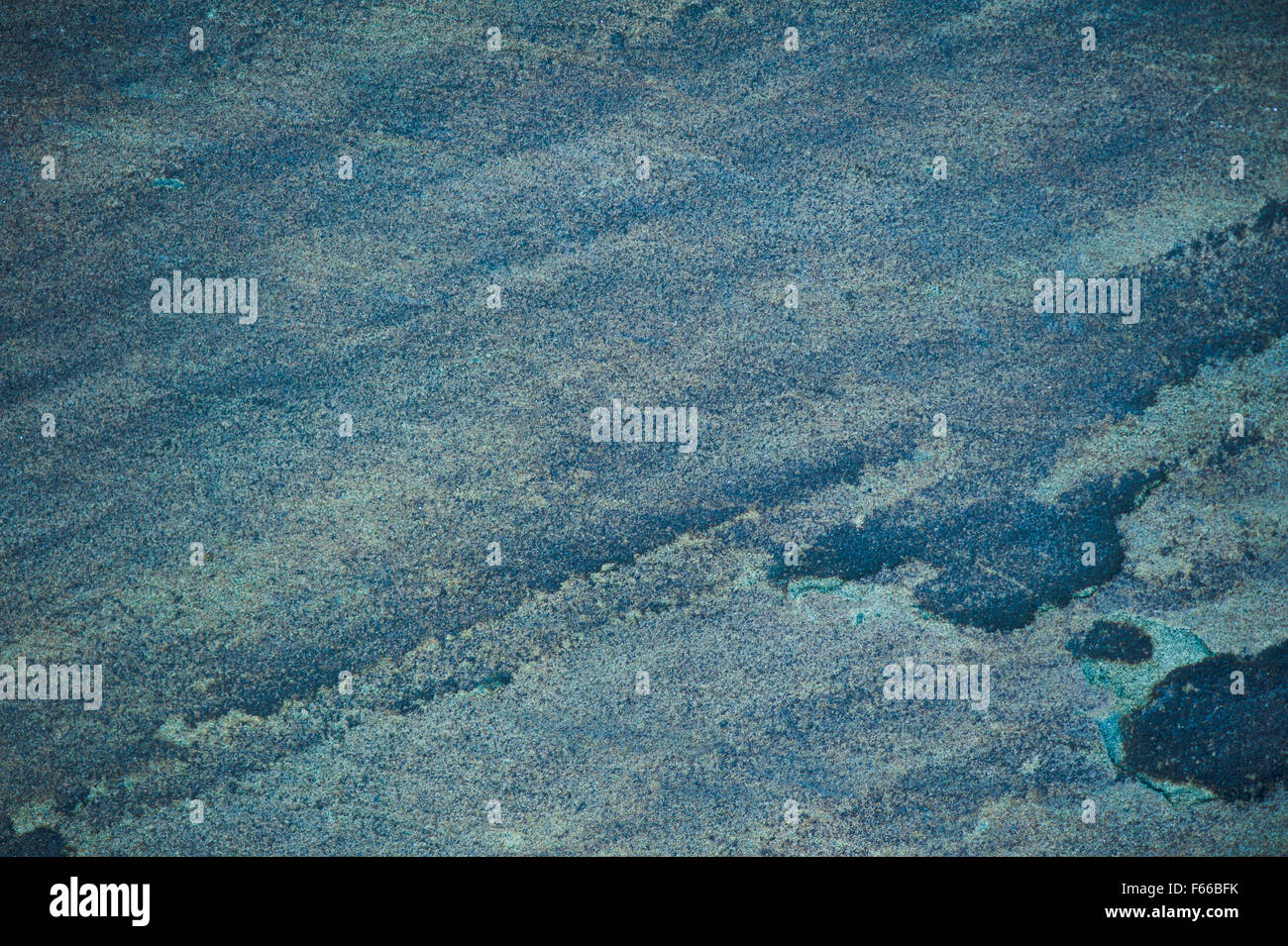 Stone grunge blue surface abstract, colored rock texture, flat wall background in horizontal orientation, nobody... Stock Photo