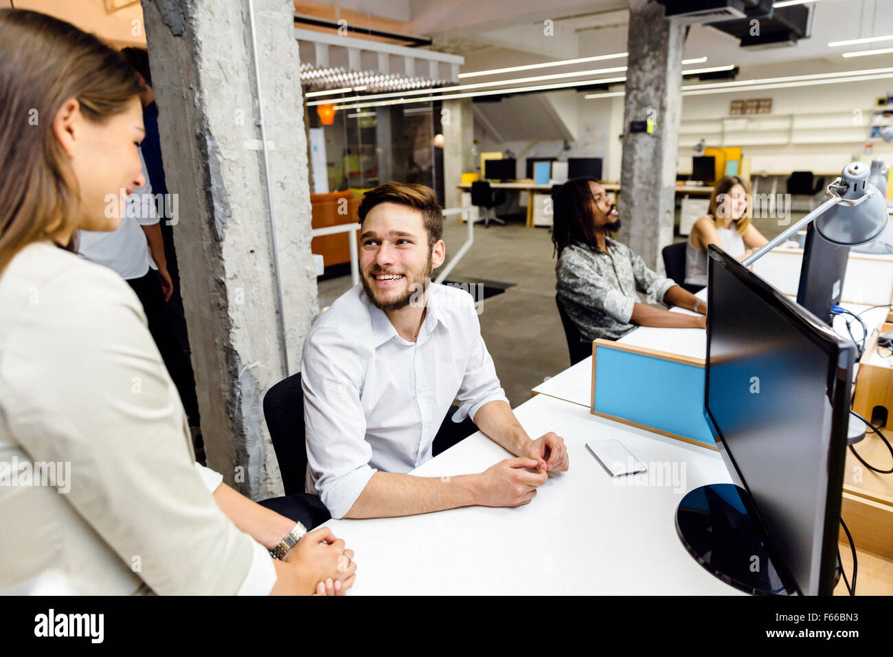 Woman office employee talking hi-res stock photography and images - Alamy