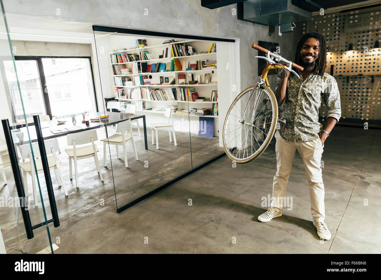 Businessman riding a bicycle to work Stock Photo Alamy