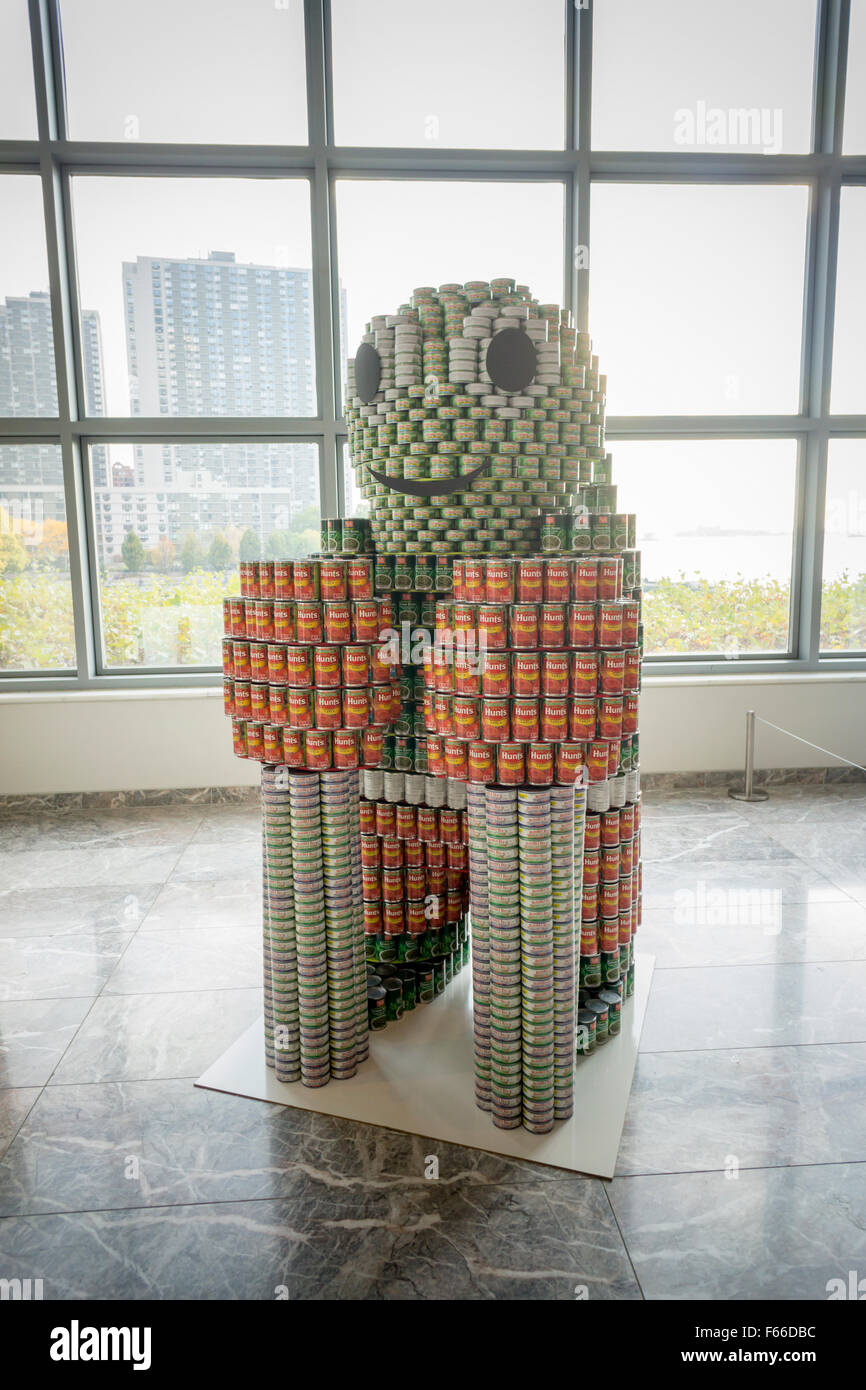 Tony the Turtle Knocks Out Hunger by CALLISONRTKL in the 23rd annual Canstruction Design Competition in New York, seen on Friday, November 6, 2015, on display in Brookfield Place. The sculpture is made of 3151 cans and will feed 1470 New Yorkers. Architecture and design firm participate to design and build giant structures made from cans of food.  The cans are donated to City Harvest at the close of the exhibit. Over 100,000 cans of food were collected and will be used to feed the needy at 500 soup kitchens and food pantries. (© Richard B. Levine) Stock Photo