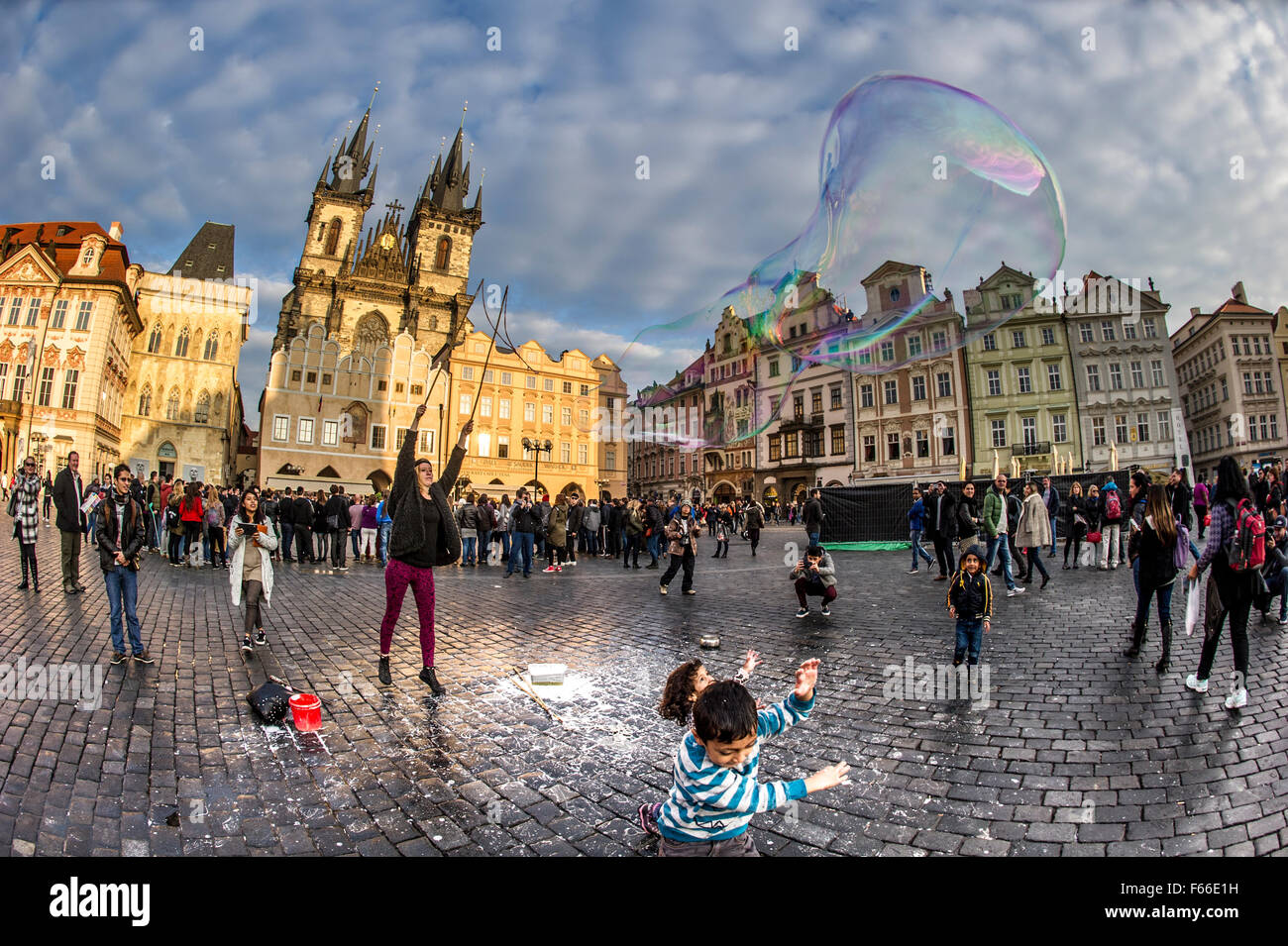 Huge bubbles being blown in Staroměstské náměstí Stock Photo