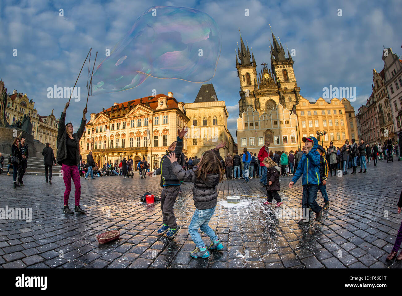 Huge bubbles being blown in Staroměstské náměstí Stock Photo