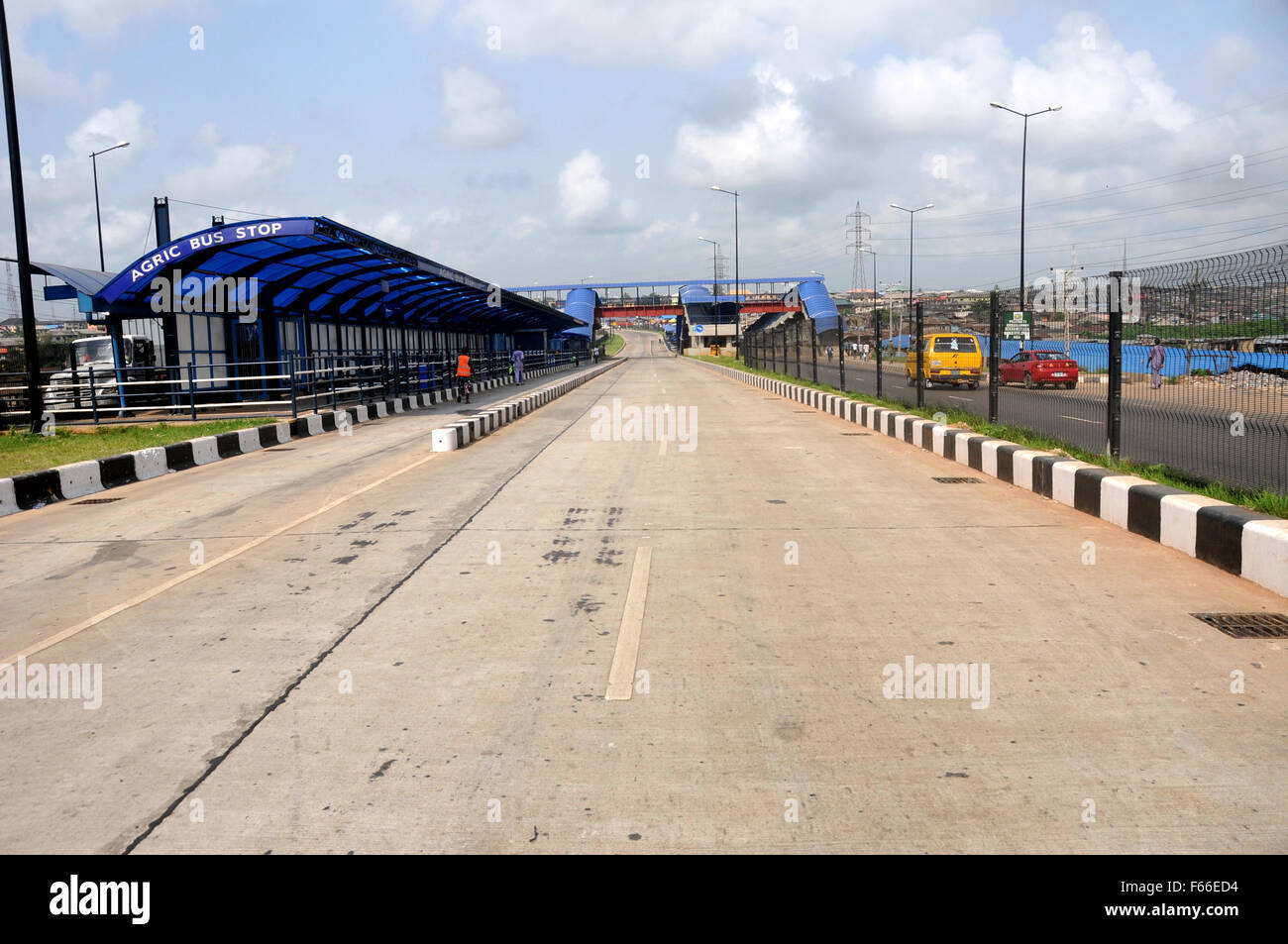 Lagos. 12th Nov, 2015. Photo taken on Nov. 12, 2015 shows the completed Mile 12-Ikorodu road in Lagos, the largest city in Nigeria. The Mile 12-Ikorodu road widening and Bus Rapid Transit (BRT) projects constructed by China Civil Engineering Construction Company (CCECC) in Lagos, Nigeria's economic hub, are set to bring benefit to millions of residents and motorists of the state. Credit:  Jiang Xintong/Xinhua/Alamy Live News Stock Photo