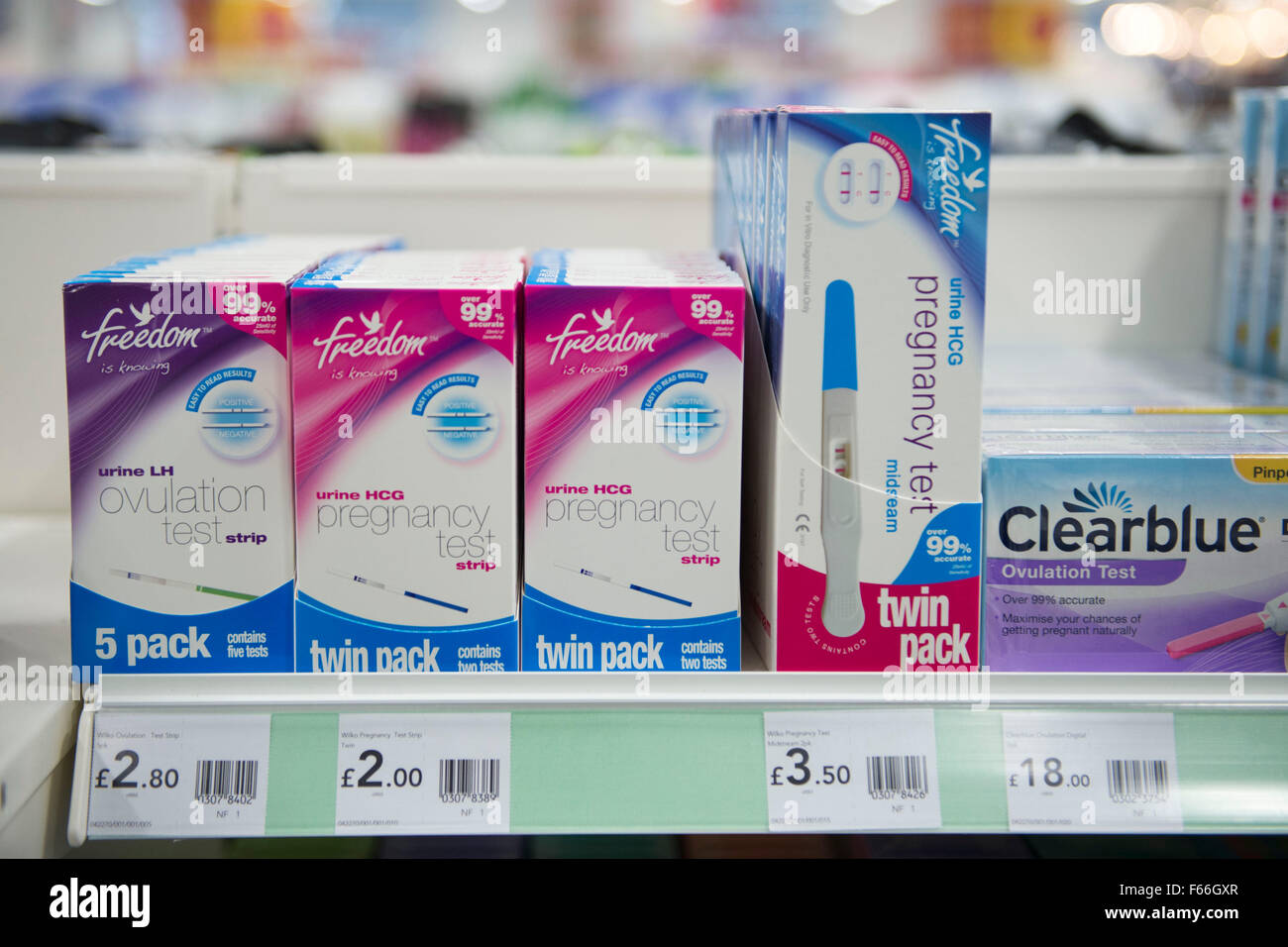 Pregnancy testing kits for sale on a shelf in a chemist shop. Stock Photo