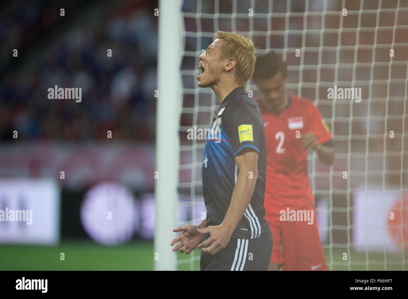 Honda Keisuke reacts after missing a chance, Japan vs Singapore in the 2018 FIFA World Cup Russia Qualifiers Round 2 - Group E at the Sports Hub Stadium on 12 Nov 2015 in Singapore. Japan beat Singapore 3-0. (Photo by Haruhiko Otsuka/Nippon News & Aflo) Stock Photo
