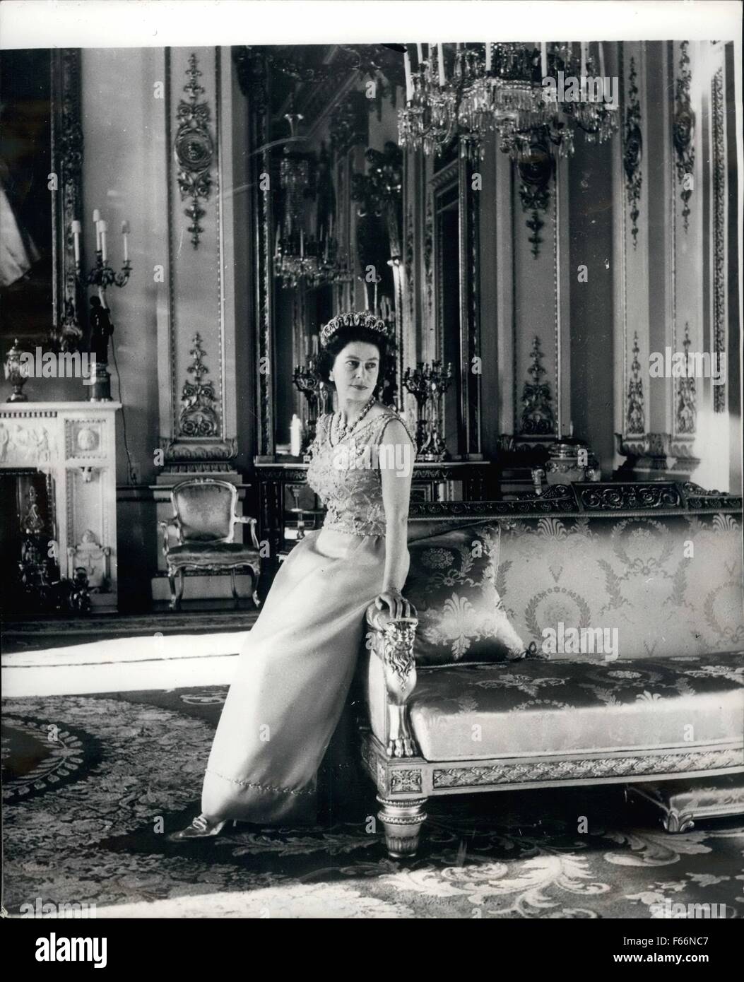 1969 - H.M. Queen Elizabeth II H.M. The Queen's 43rd Birthday was celebrated on Monday, 21st April 1969. Her majesty, in a turquoise silk evening dress is portrayed in the White Drawing Room at Buckingham Palace. The Pearl and diamond tiara she is wearing was bought by Queen Mary from the family of the Grand Duchess Vladimir of Russia in 1921; the pearl and diamond necklace was presented to Queen Victoria at the time of the building of the Albert Hall. The settee with the carved frame is English, of the Regency period. © Keystone Pictures USA/ZUMAPRESS.com/Alamy Live News Stock Photo