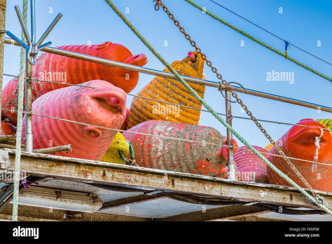 dirty floating buoys piled it on the boat Stock Photo Alamy