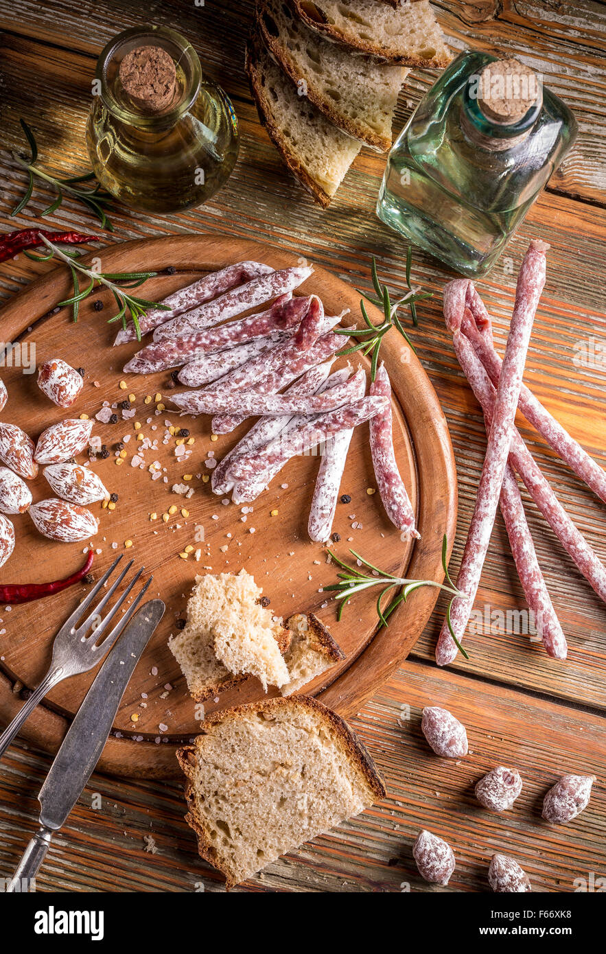 Cold meat plate with salami sticks and small salami Stock Photo Alamy