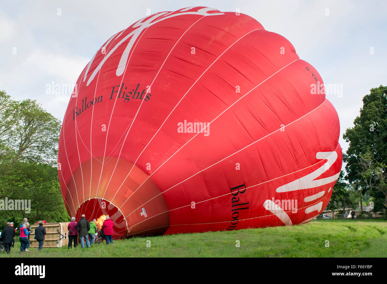 Inflating a Virgin hot air balloon. Cumbria, UK Stock Photo