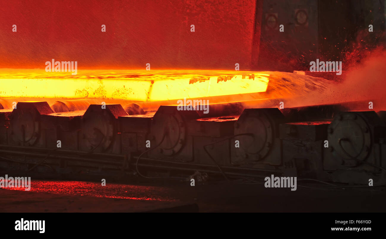 hot plate on conveyor inside of steel plant Stock Photo