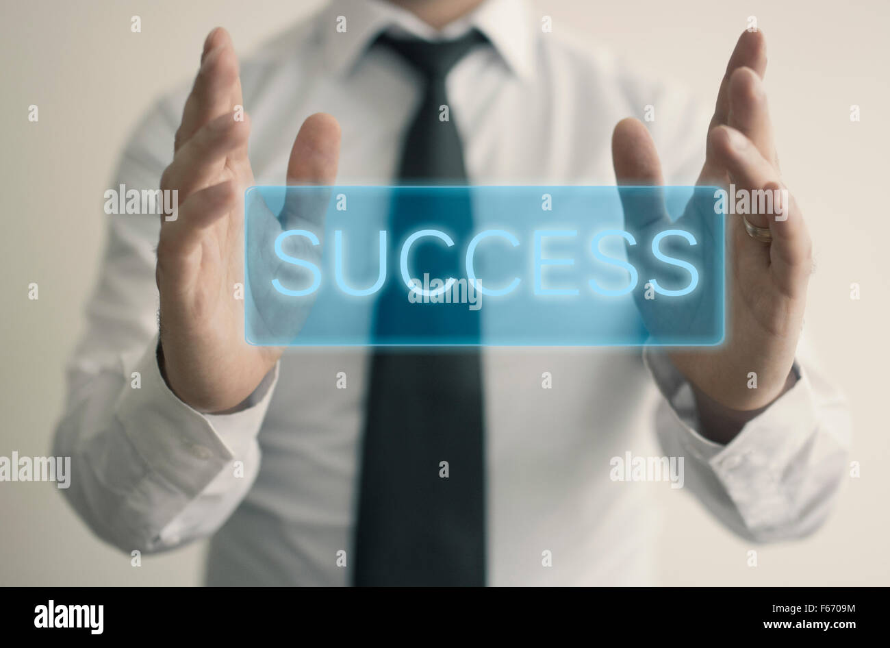 The man holds success text Stock Photo