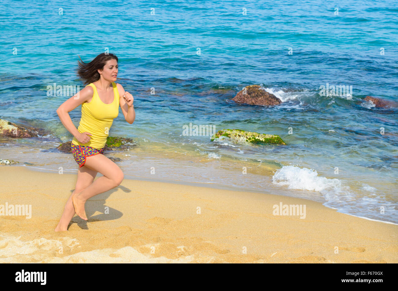 Woman runner running barefoot hi-res stock photography and images - Alamy