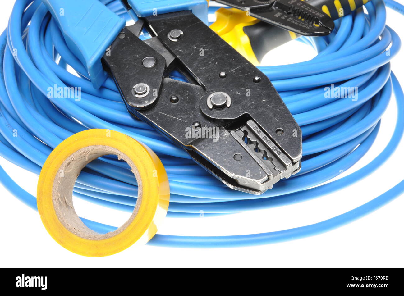 Crimping tool and cables isolated on white background Stock Photo - Alamy