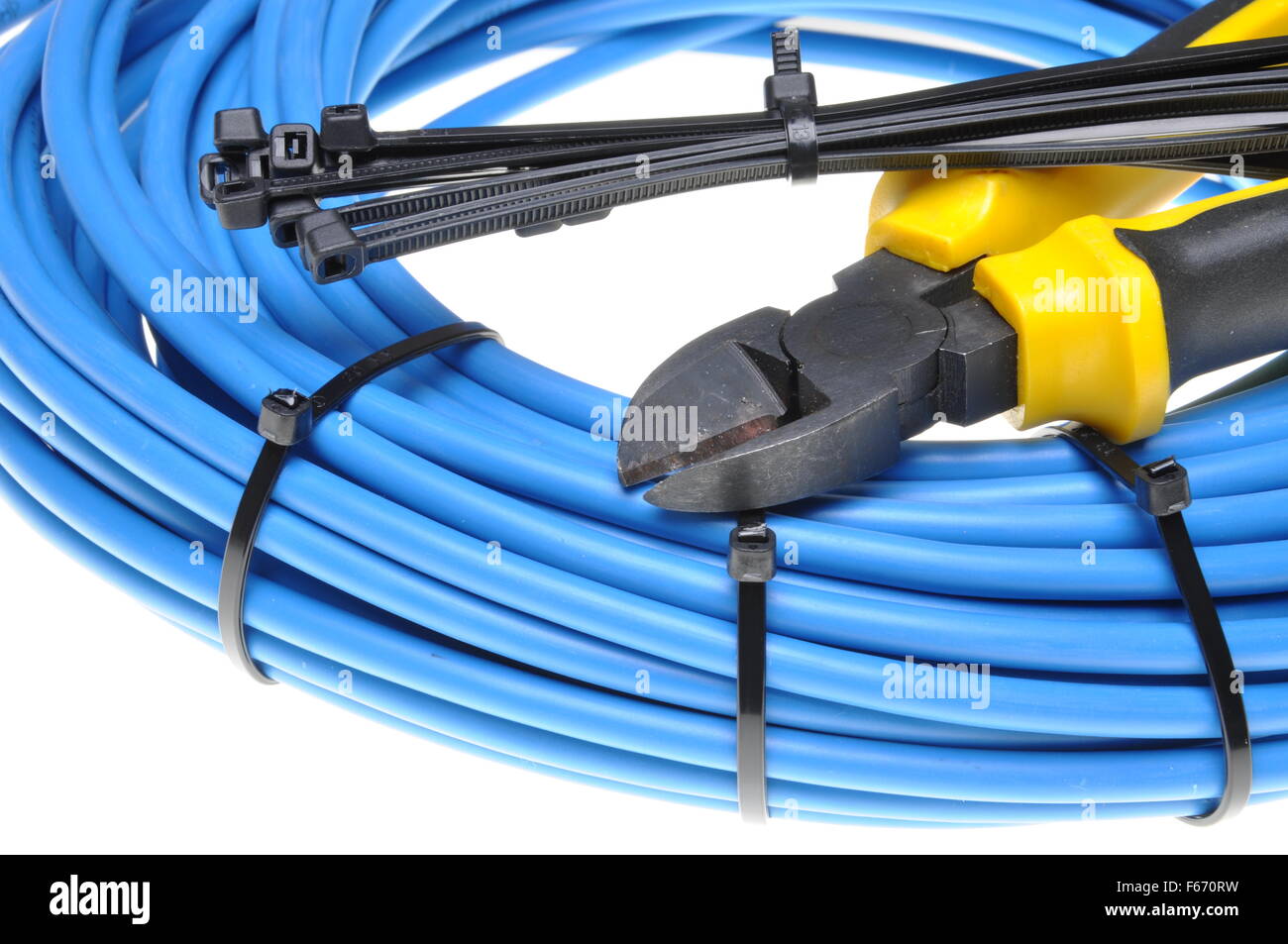 Pliers with electrical cables and cable ties Stock Photo