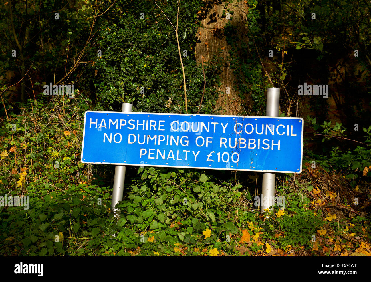 Sign erected by Hampshire County Council, no dumping of rubbish, England UK Stock Photo