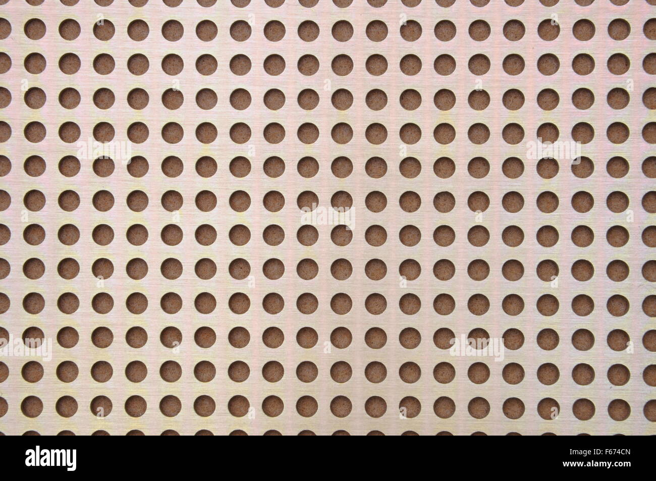 Metal sheet surface with holes Stock Photo