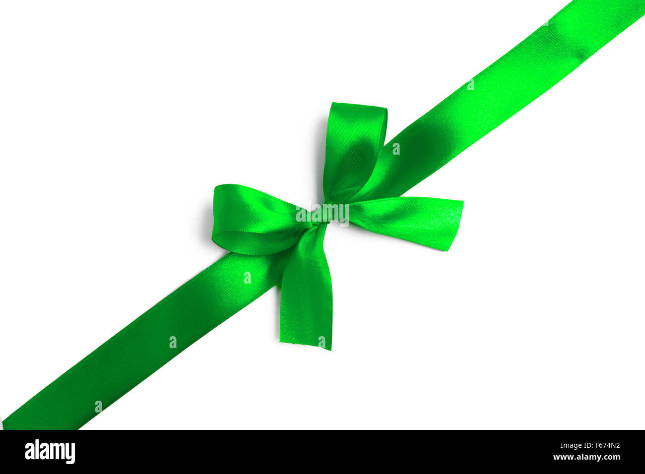 Green ribbon bow on white background Stock Photo - Alamy