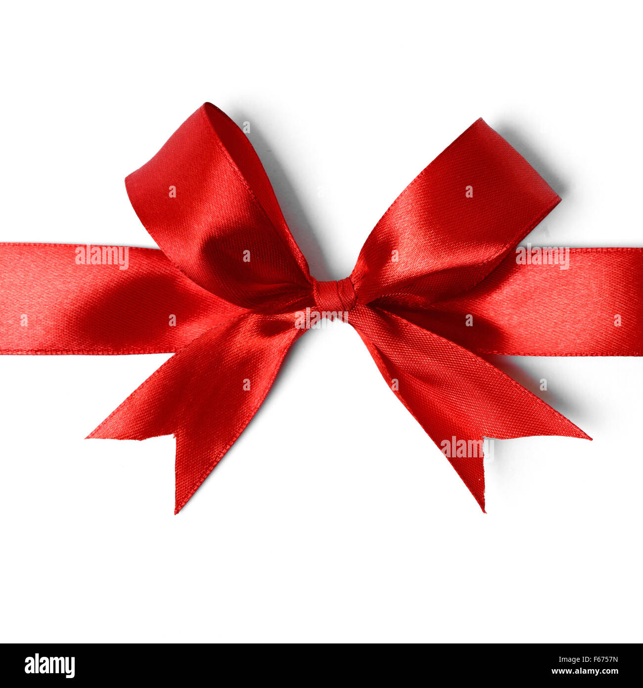 Shiny red satin ribbon on white background Stock Photo - Alamy