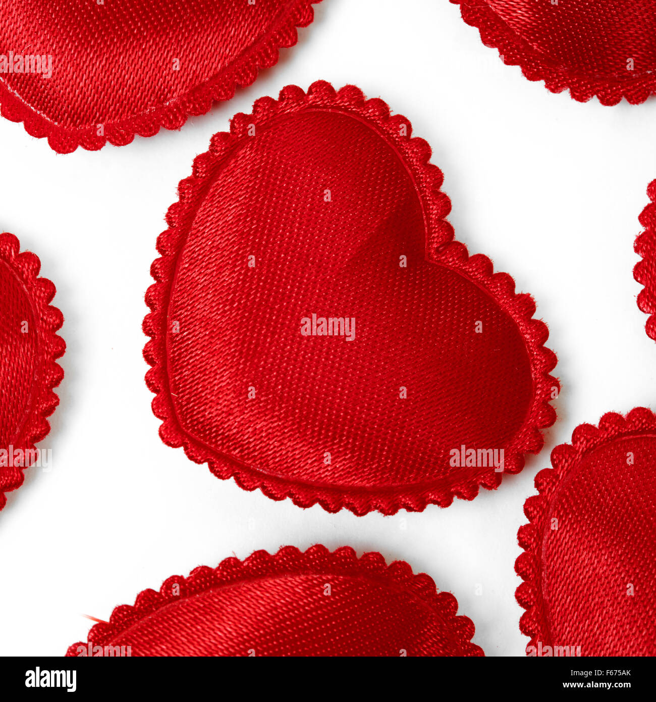 Felt red hearts isolated on a white background Stock Photo - Alamy