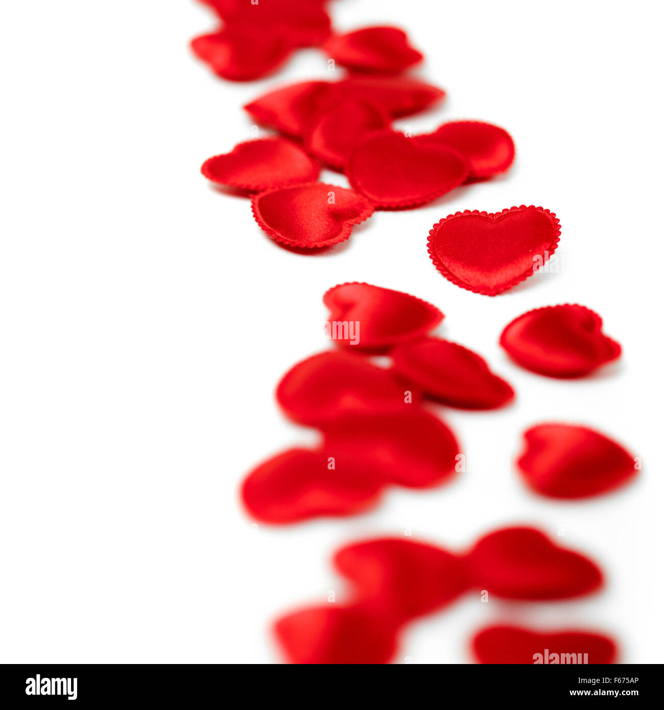 Felt red hearts isolated on a white background Stock Photo - Alamy