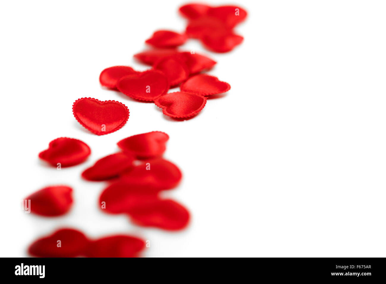 Felt red hearts isolated on a white background Stock Photo - Alamy